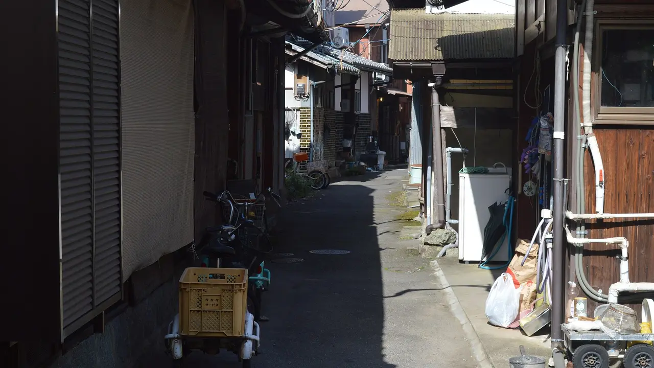 A narrow alley between houses on Okishima, Lake Biwa, Shiga, Japan