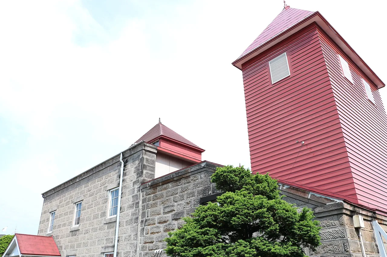 Stone and red-roofed still house buildings at the Nikka Yoichi Distillery, Hokkaido, Japan
